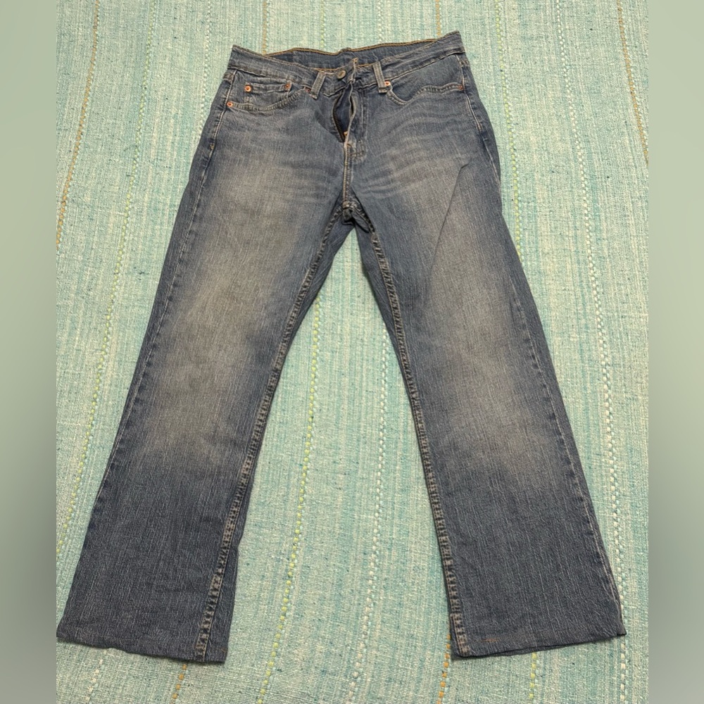 Levi’s 527 size 31 waist .. length shortened see photos.